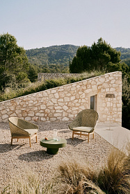 Кресло Olbia из искусственного ротанга и массива тика